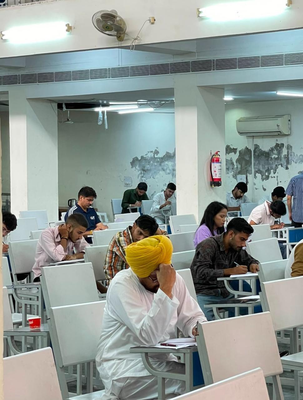 A Photo From an Exam Hall: Where Do We Draw the Line?