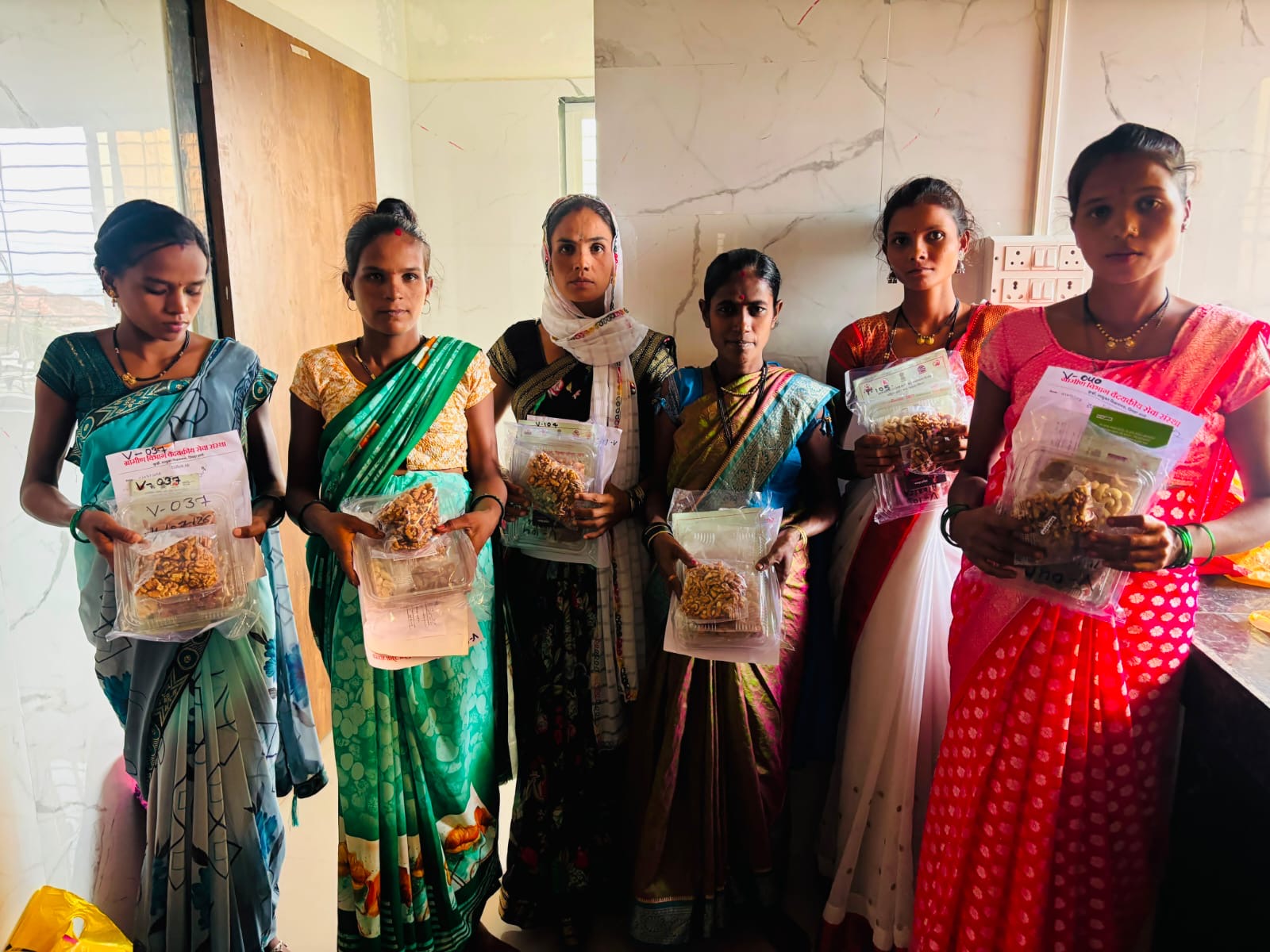 Pratiksha Jhaver Foundation and Gramin Vibhag Medical Seva Sanstha Distribute Dry Fruits to Pregnant Women to Reduce Maternal and Infant Mortality.