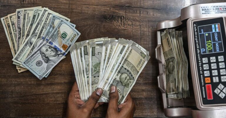 Indian Rupee Plummets to New Low as Global Oil Prices Surge