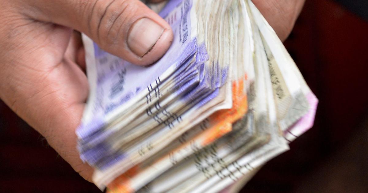 Indian Rupee Hits Record Low of 96.9 Against US Dollar Amid Economic Turmoil